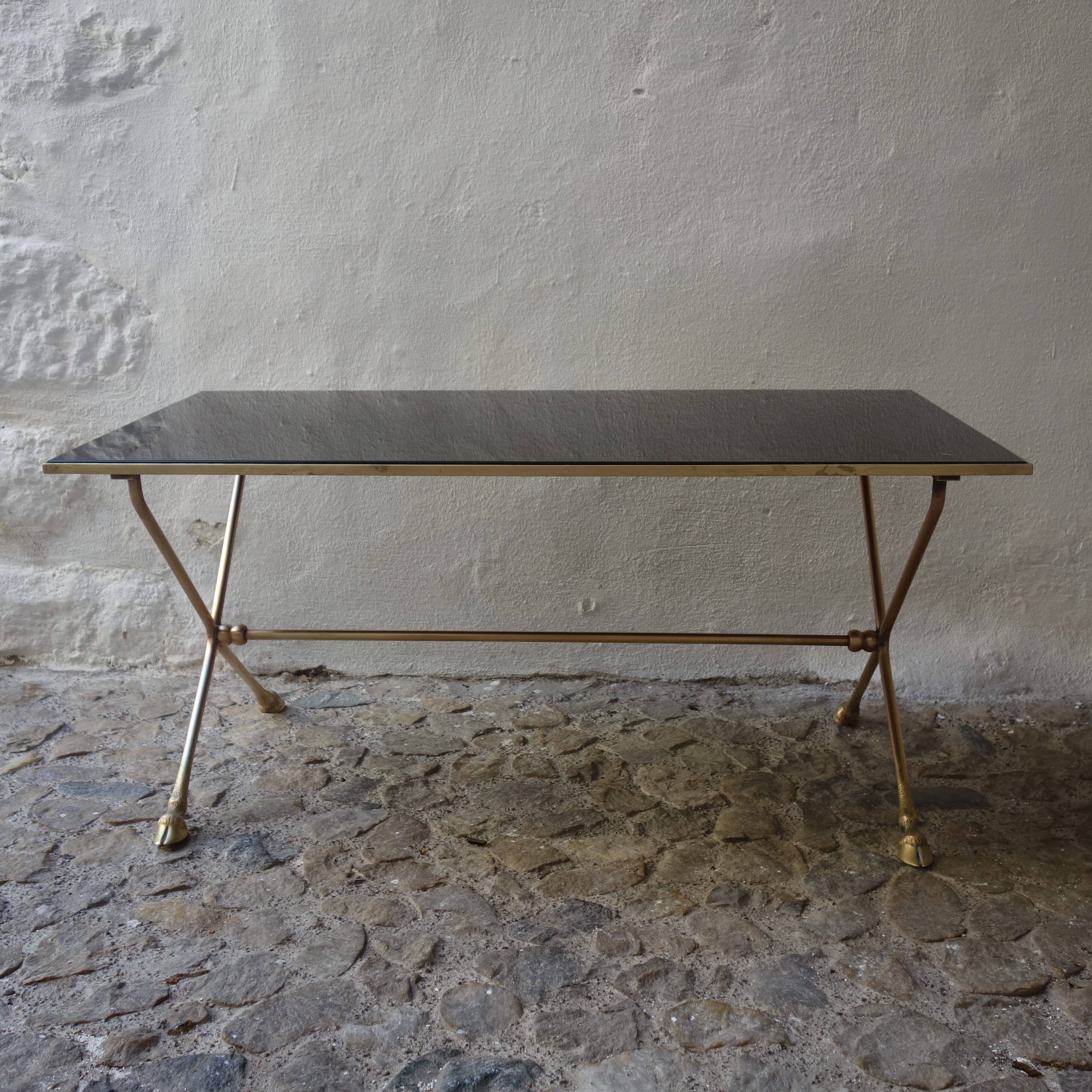 Rectangular coffee table in smoked glass and brass, animalist legs