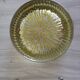 Empty round pockets of iridescent transparent glass of yellow sticks