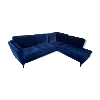 Corner sofa blue velvet sits
