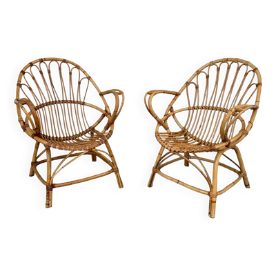 Paire de fauteuils coquille vintage 1950