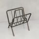 Black painted metal magazine holder