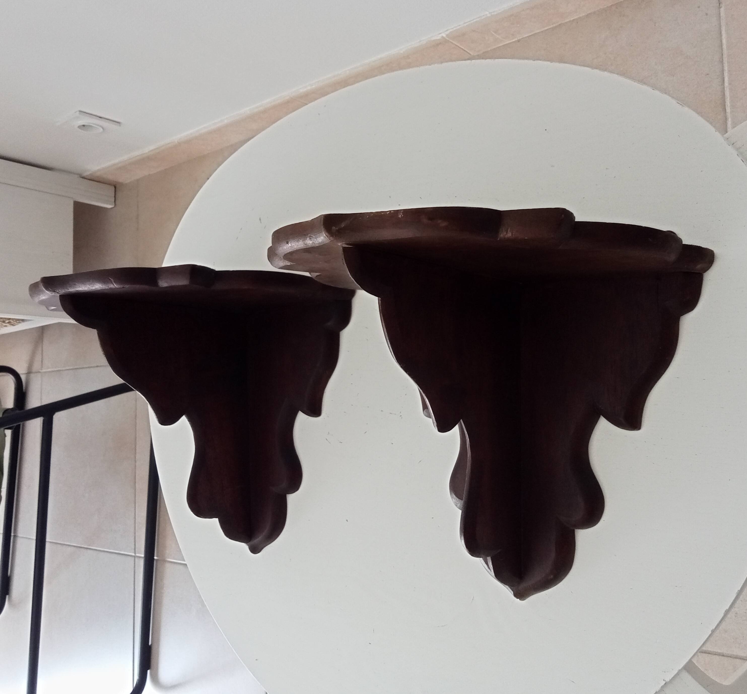 Pair of antique carved wooden shelves