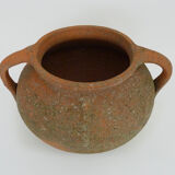 Old round jar with double handles. Year 70