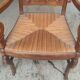 Armchair with gilded rye straw seat in solid walnut, Restoration period, circa 1820
