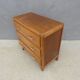 commode vintage en bois pieds compas
