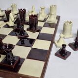 Original chess set in glazed terracotta, signed and numbered