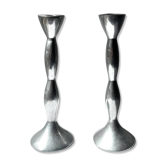 Pair of wavy aluminium candle holders