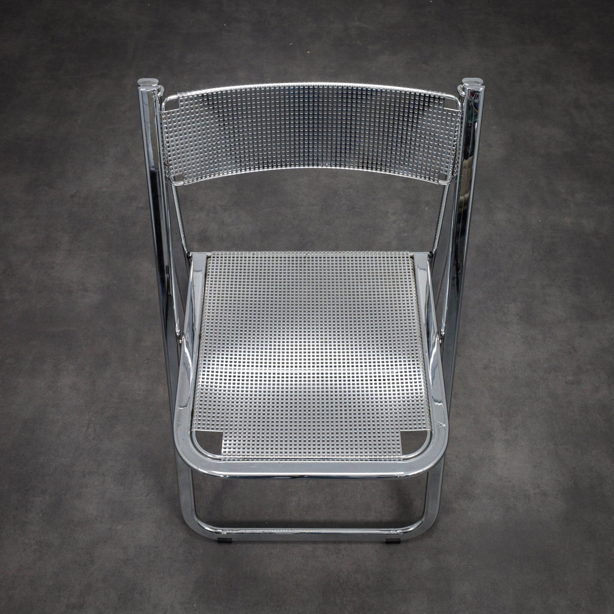 "Tamara" perforated metal folding chair by Arrben Italy (1980s)