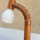 Articulated lamp in pine and opaline