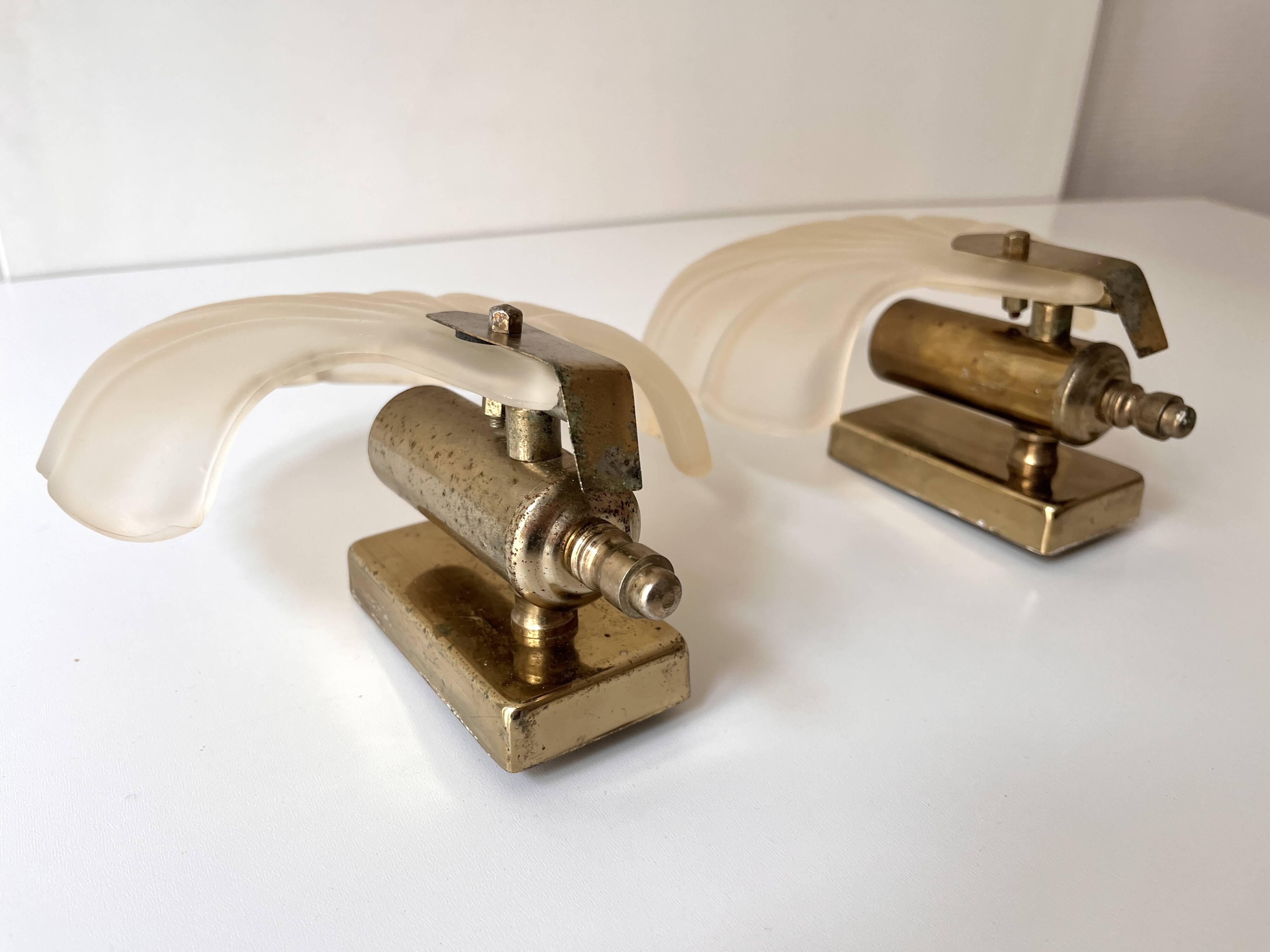 Pair of vintage shell glass wall lights, Art Deco style fixtures.