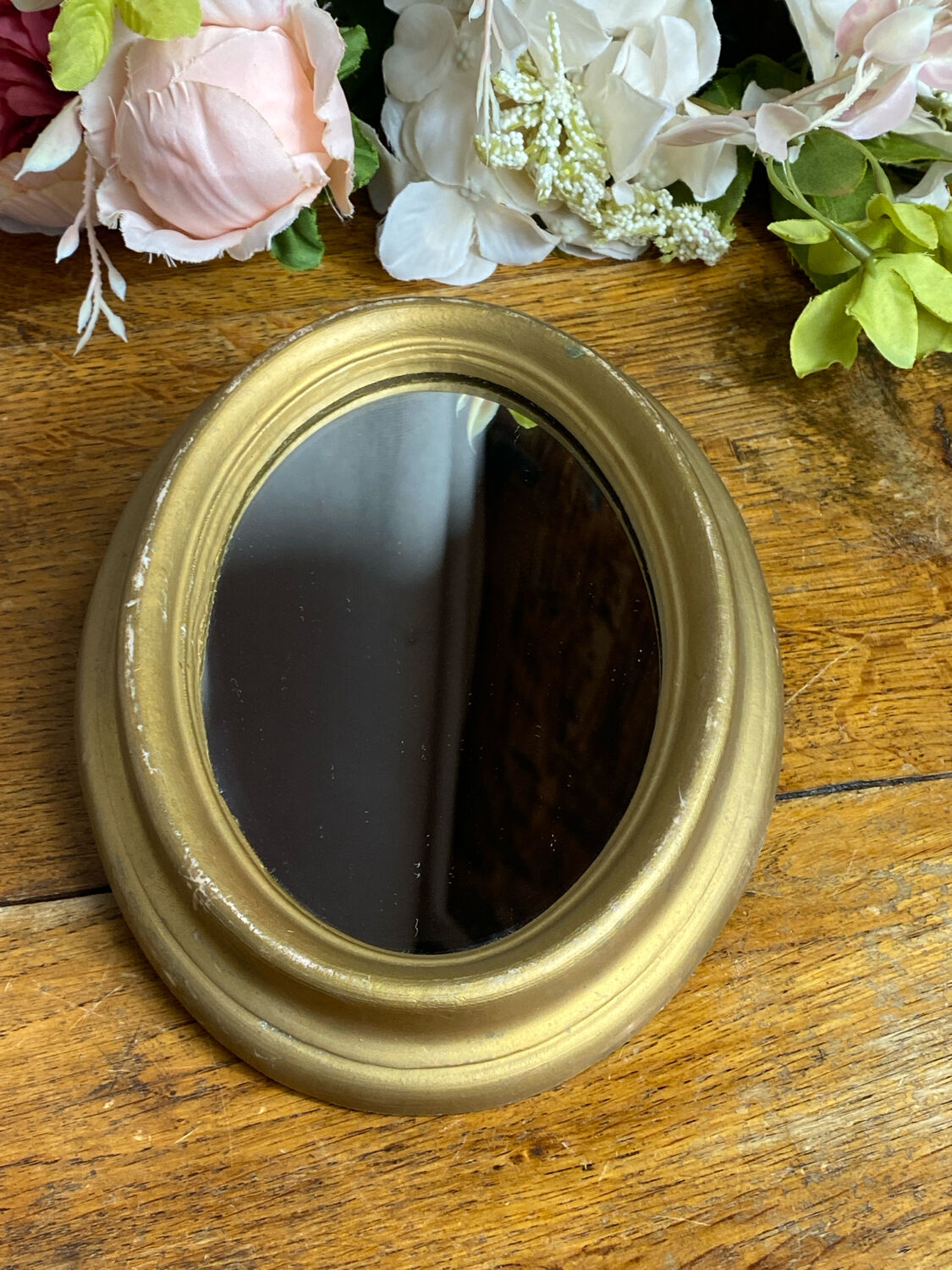 Small Italian oval-shaped mirror