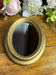 Small Italian oval-shaped mirror