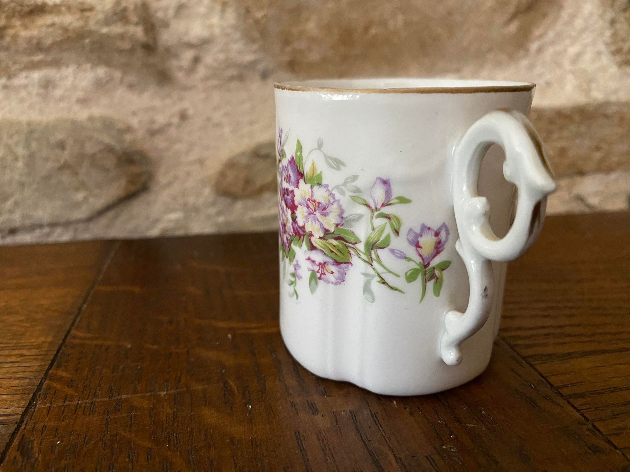 Porcelain cup fine decoration flowers and golden edge