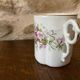 Porcelain cup fine decoration flowers and golden edge
