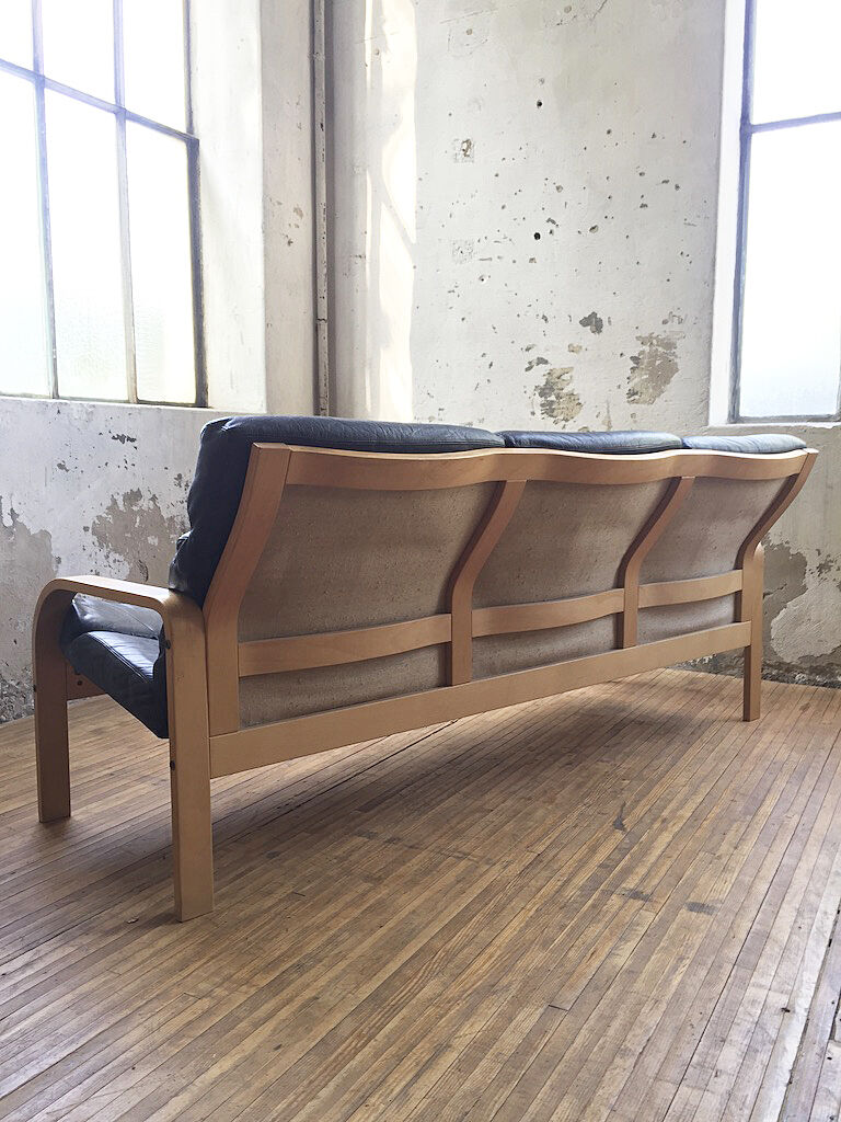 Danish sofa and armchairs curved wood and leather
