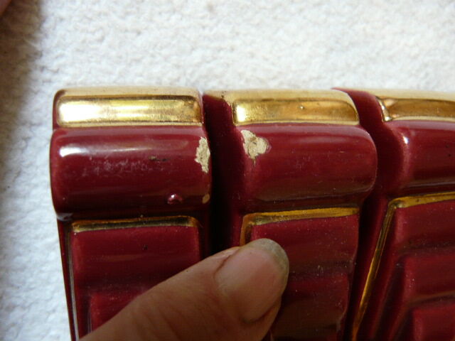 together 12 carries knives and a red enamelled earthenware bottle