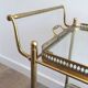 Neoclassical brass trolley with removable trays.