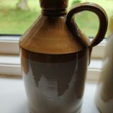 Duo of stoneware decanter bottles