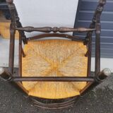Pair of blackened wooden armchairs