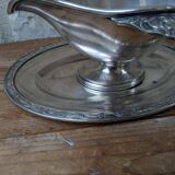Old sauce boat on fixed frame in silver metal M & Co