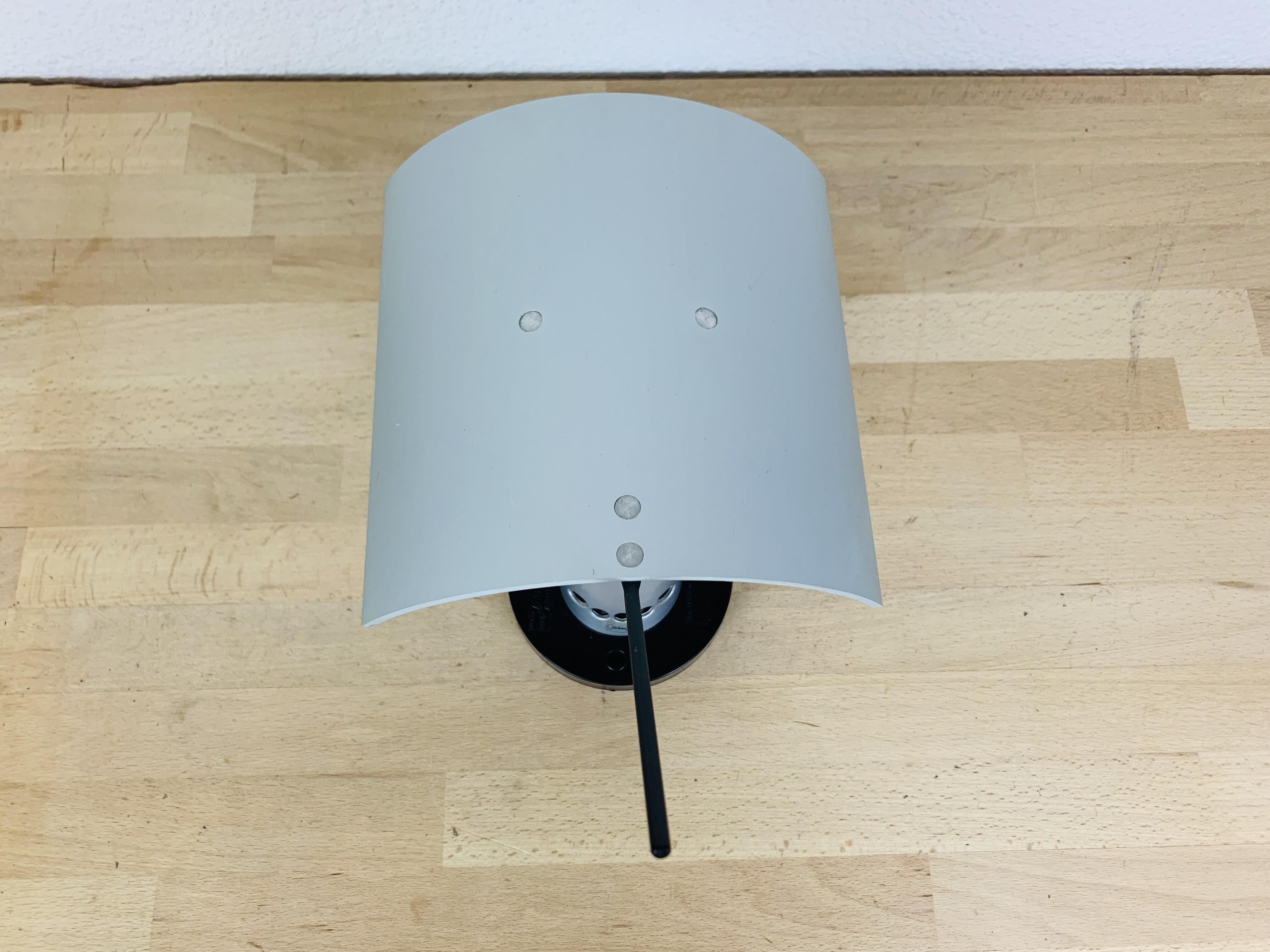 Artemide Enea wall lamp by Antonio Citterio