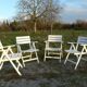 Four vintage wooden garden armchairs from the 1950s