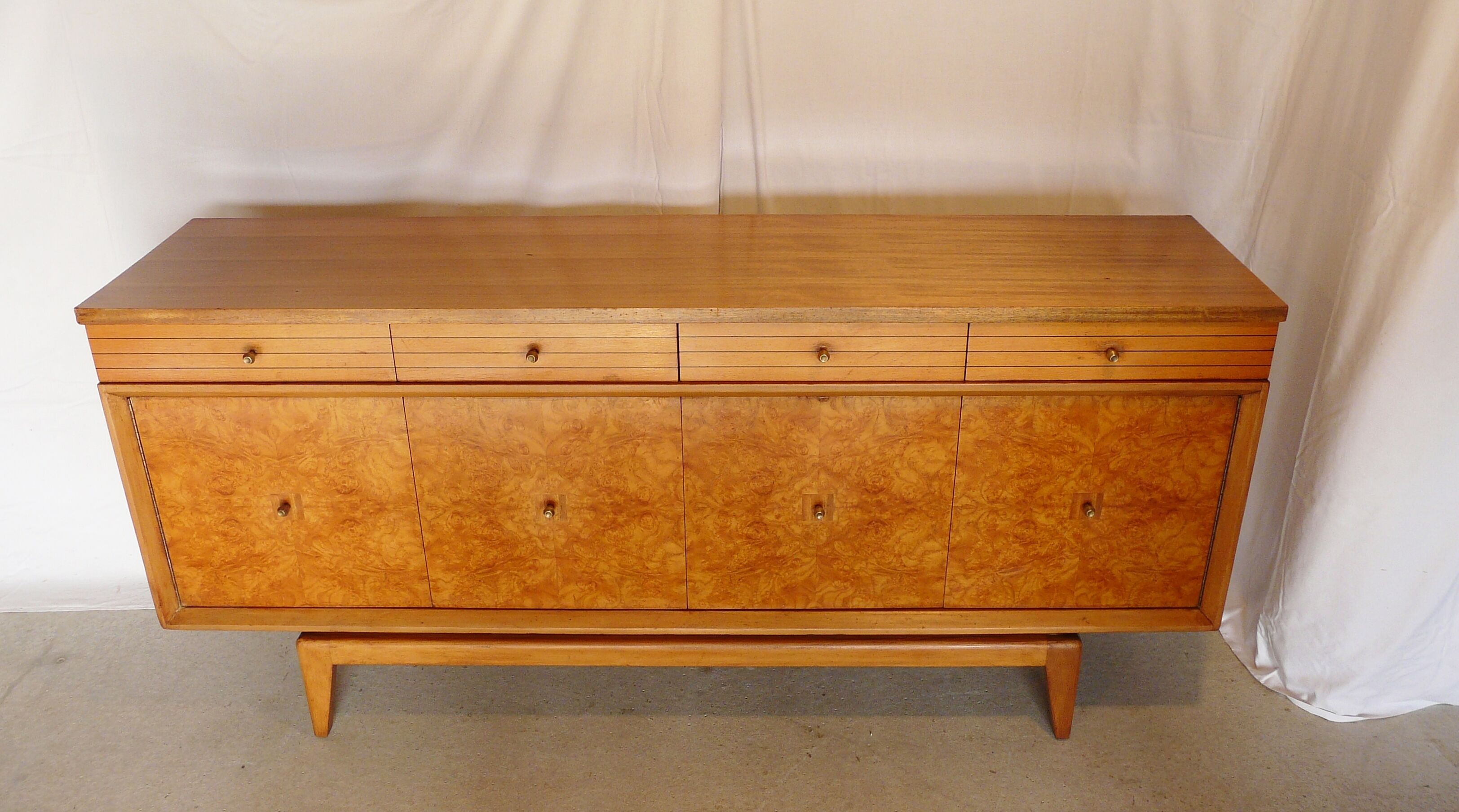 Scandinavian sideboard of blond wood and teak