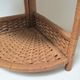 Corner shelf made of vintage braided natural fibers