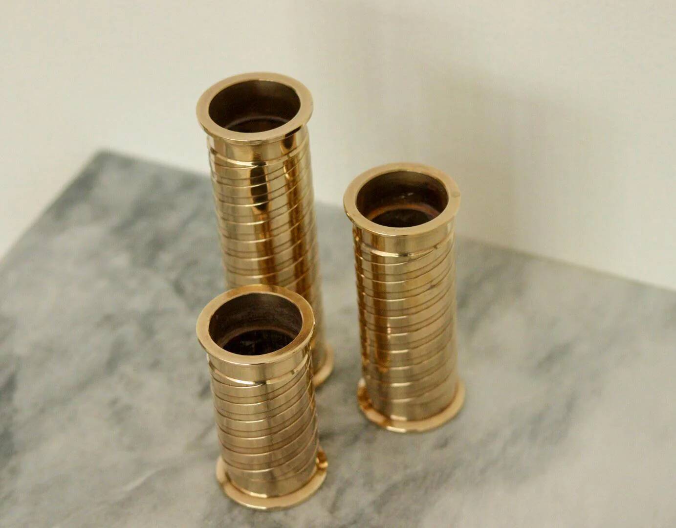Mid-century Swedish brass candlestick trio
