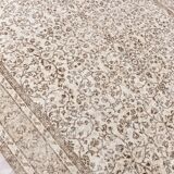 Tapis vintage à motifs floraux beige et marron