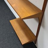 Vintage teak wall system by Poul Cadovious