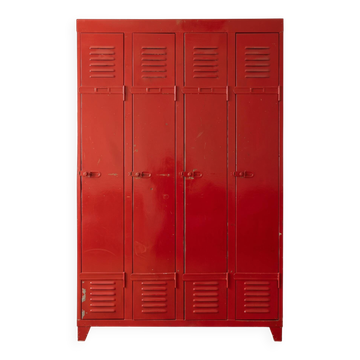 Vintage industrial wardrobe with 4 metal doors in red.