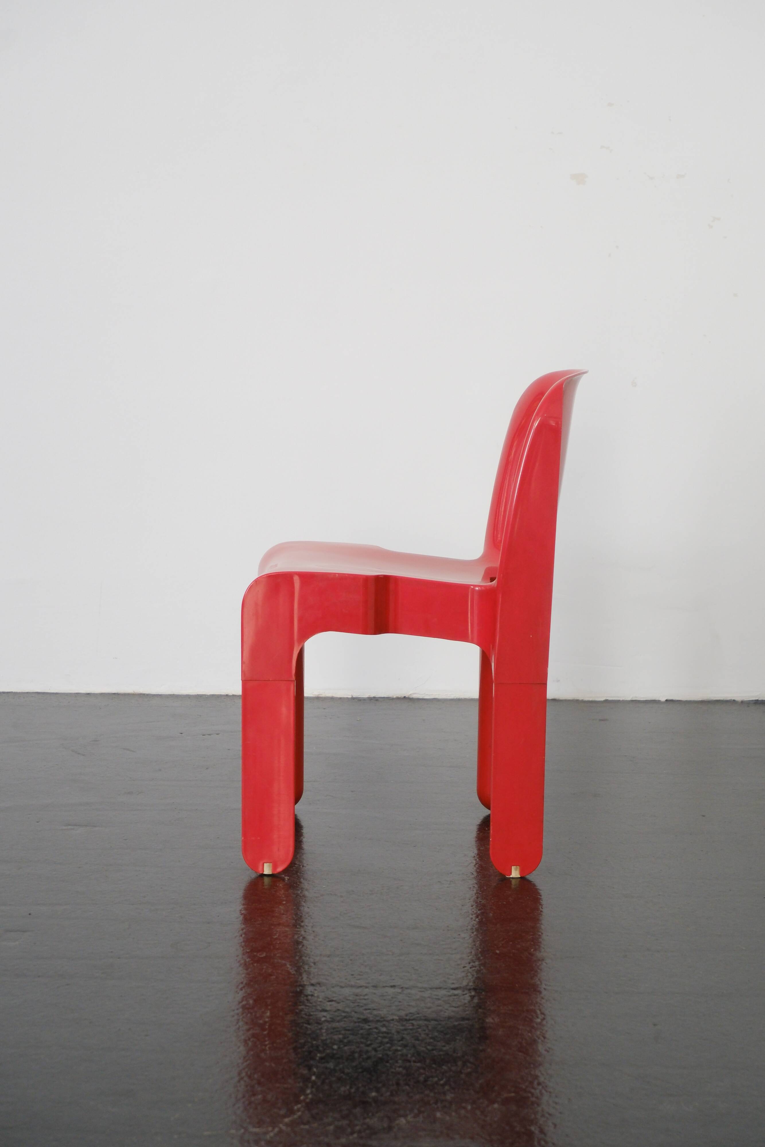 Red "Universale" chair by Joe Colombo / Kartell