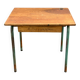 Vintage school desk made of wood and green metal - inkwell hole - antique.