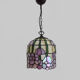 Tiffany pendant lamp in glass paste with floral decoration.