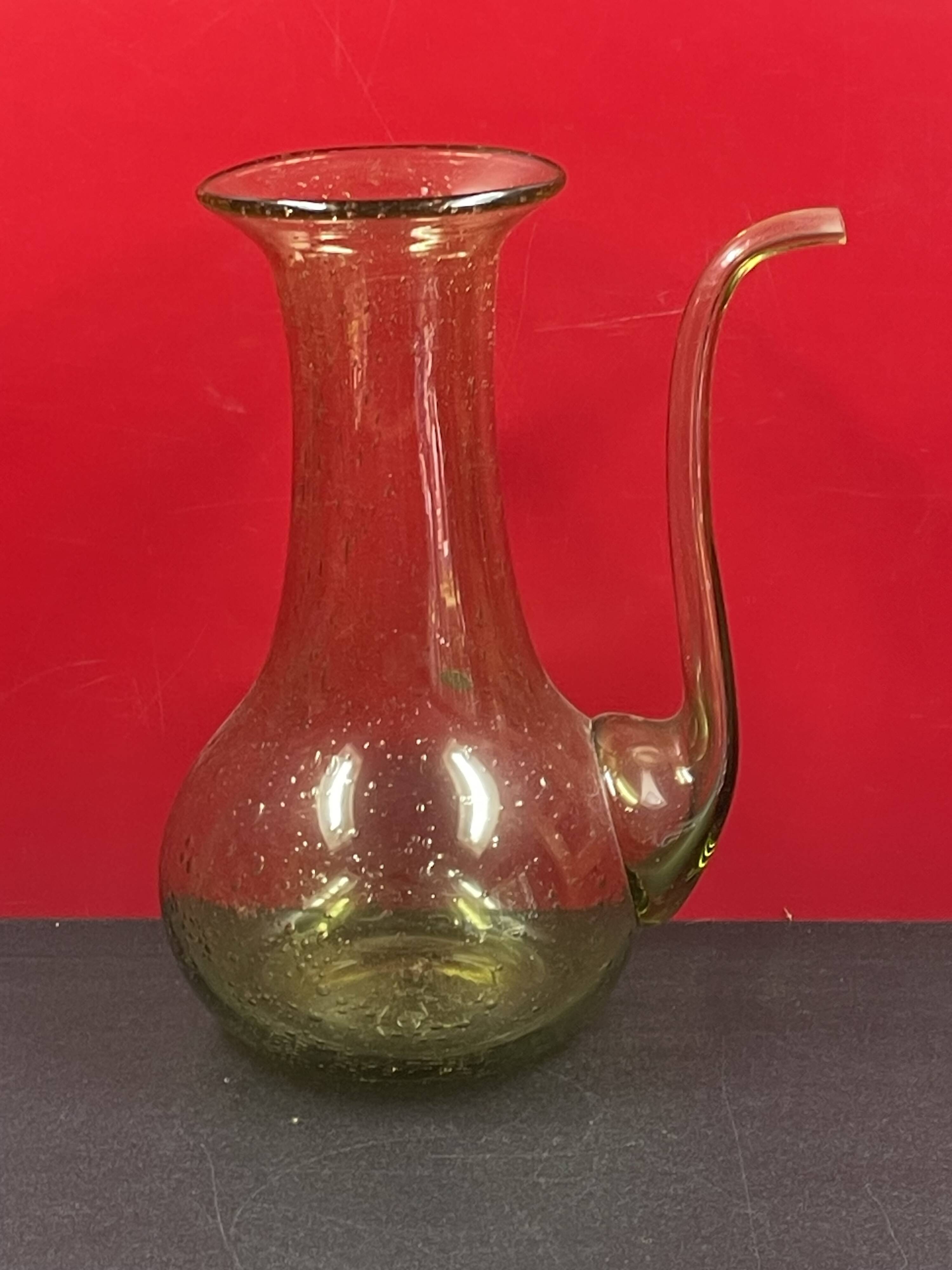 Design decanter, pourer in glassware of biot green vintage glass