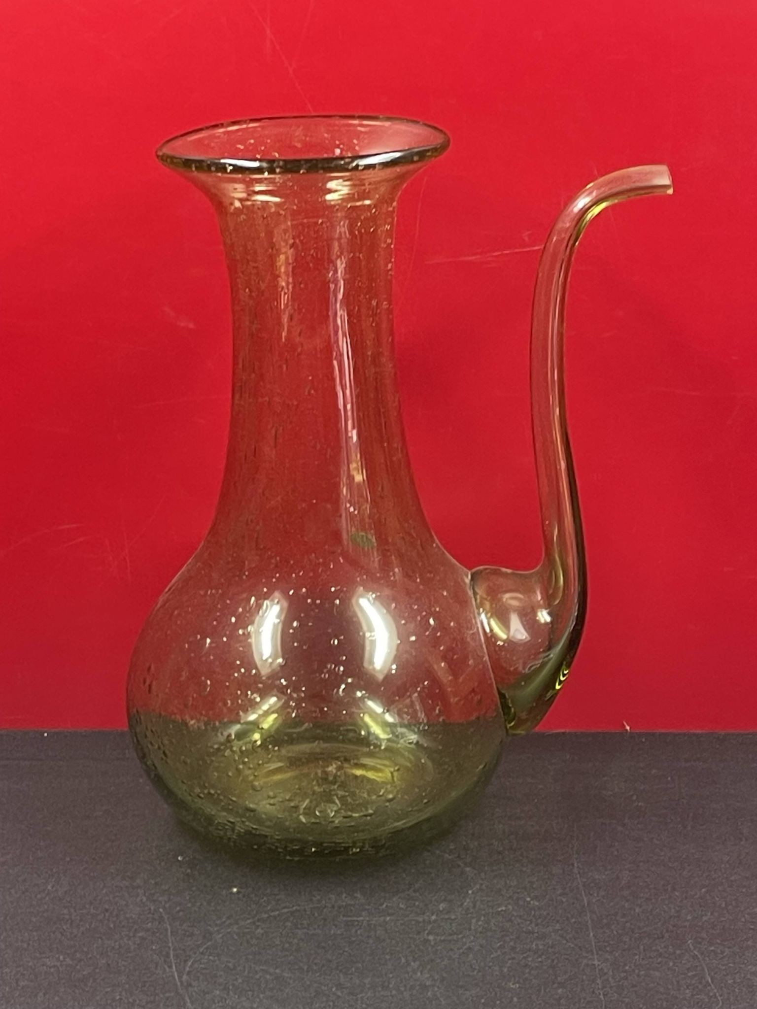 Design decanter, pourer in glassware of biot green vintage glass