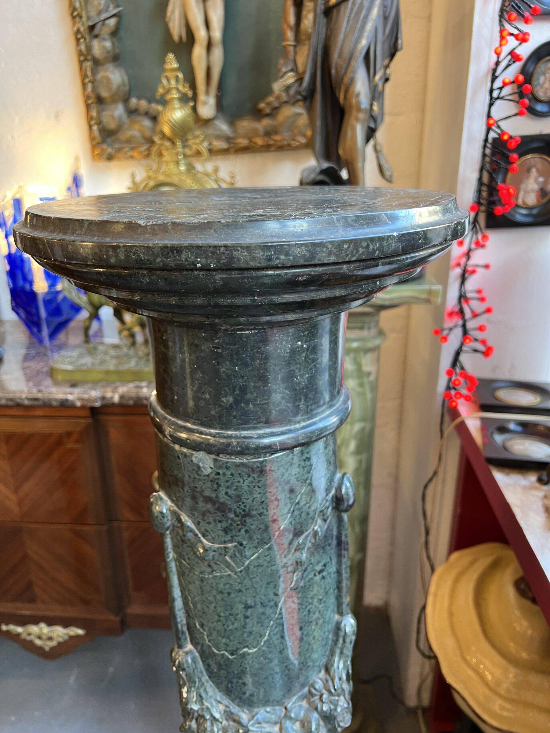 Very beautiful and ancient green marble column, dating from the 19th century