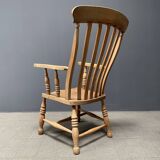 Light colored elm wood English Windsor armchair