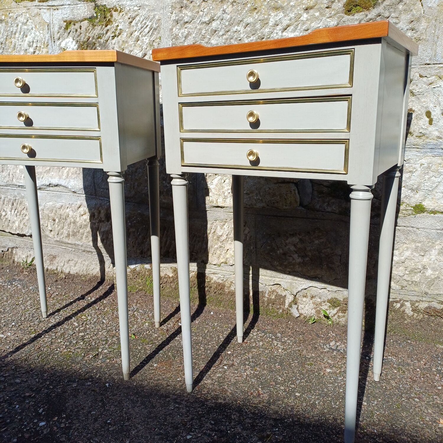 Pair of patinated bedside tables in Louis XVI style