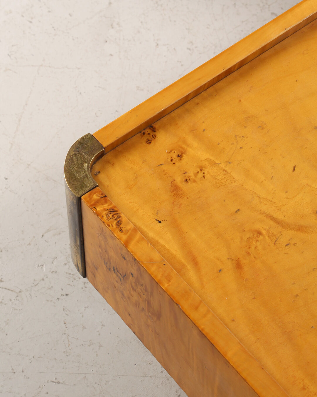Coffee table in magnifying glass and brass
