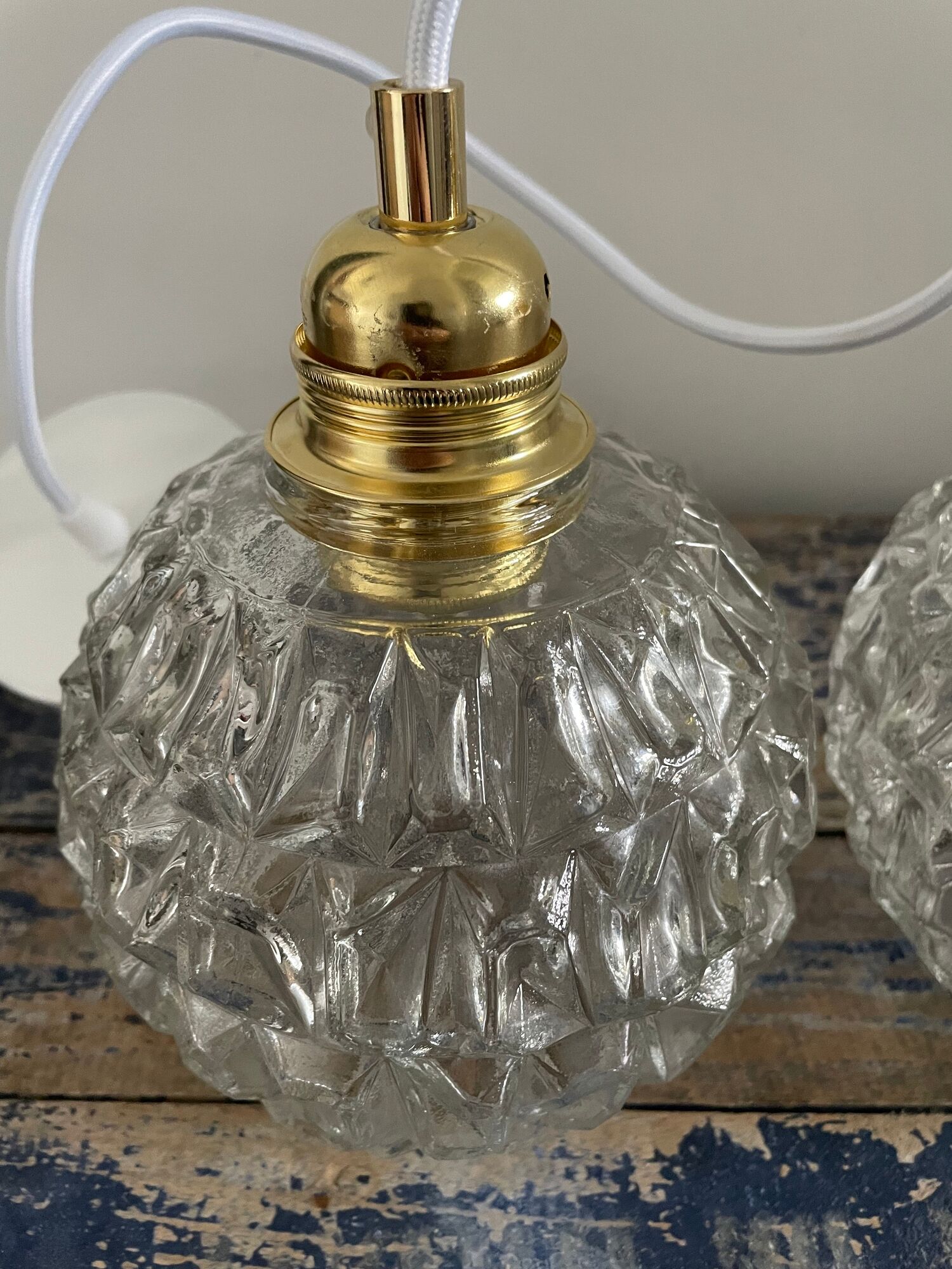 Set of two vintage electrified glass pendant lamps