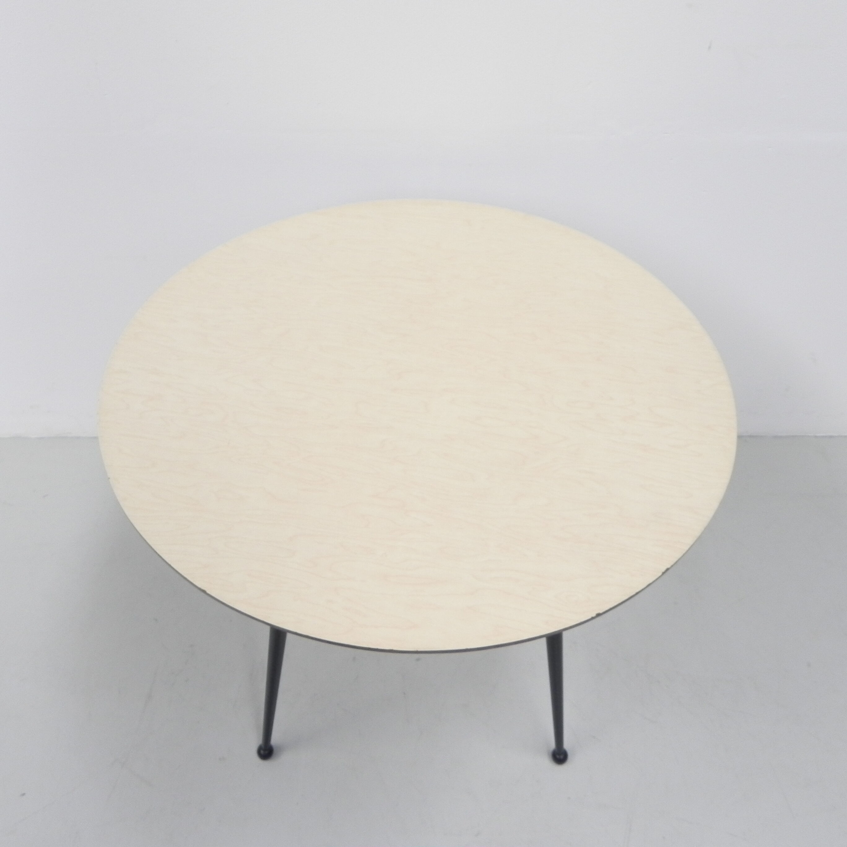 Vintage coffee table with round formica top