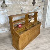 Wooden hardware cabinet painted with wood effect, circa 1940.