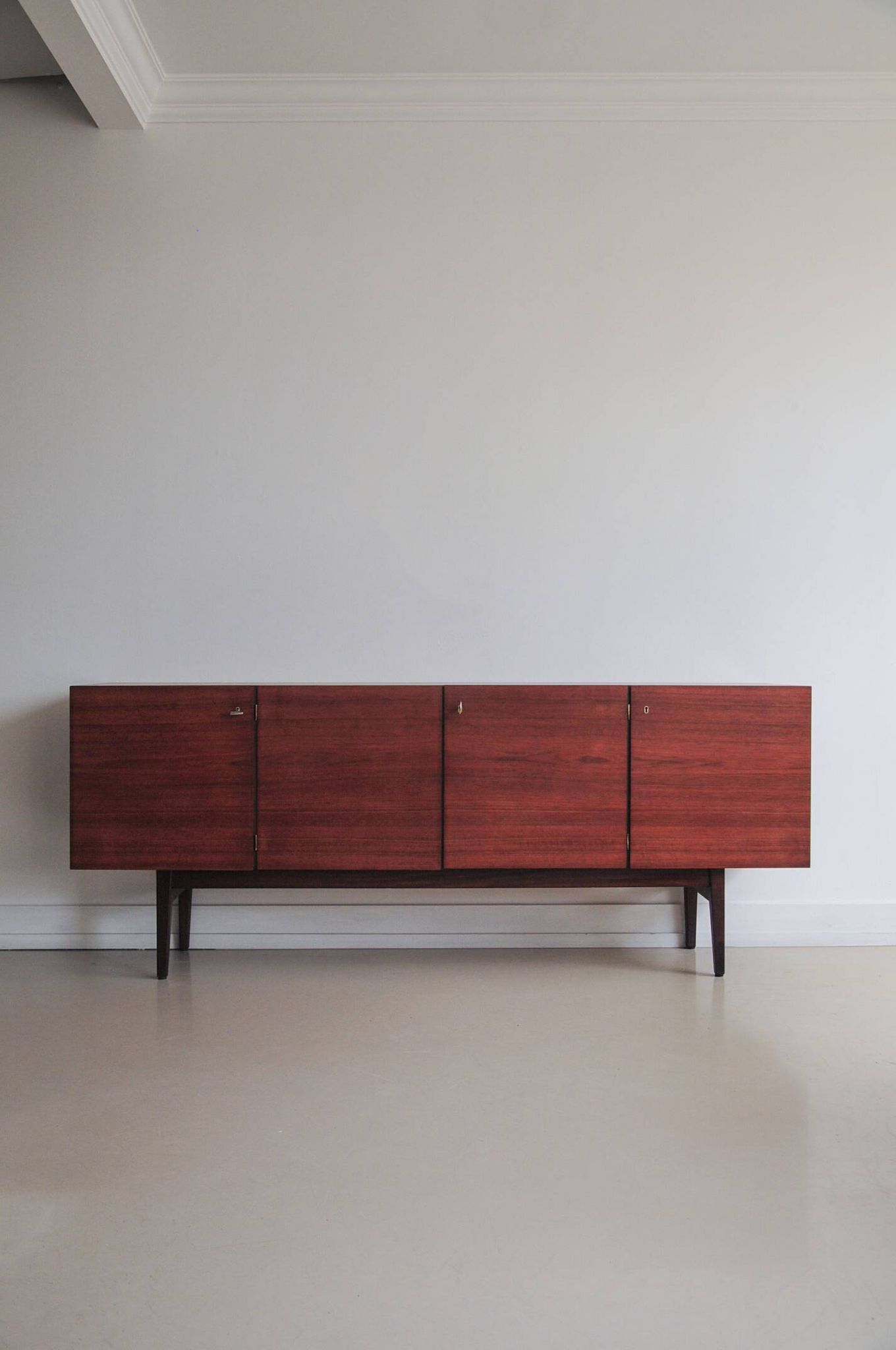 vintage Danish sideboard with black and white drawers