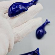 Set of 6 vintage blue porcelain whale knife rests.