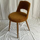 Camel barrel chair with faux fur by Baumann