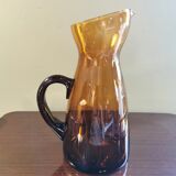 Vintage pitcher in amber glass