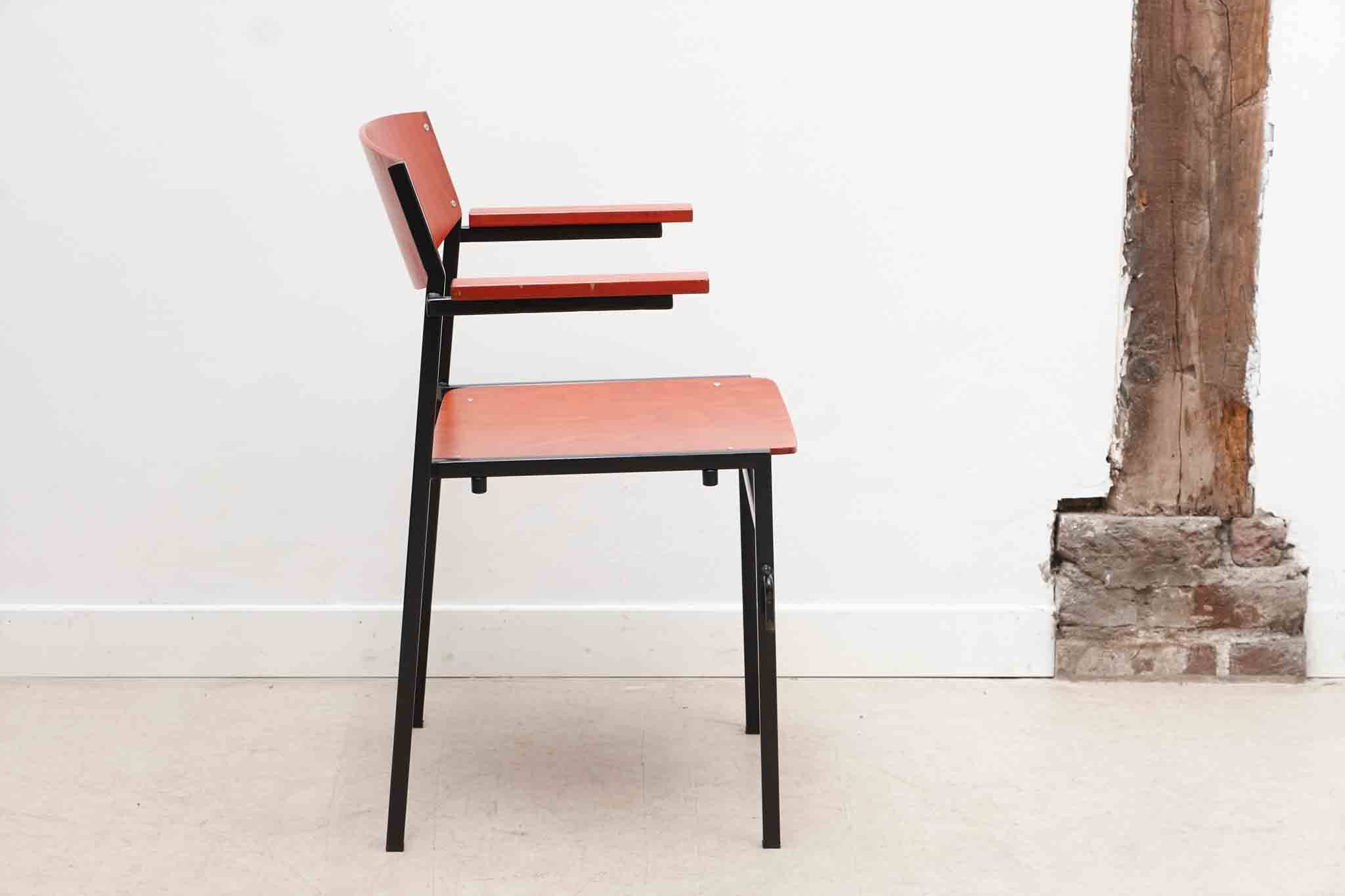 Gijs van der Sluis red and black chairs with armrests