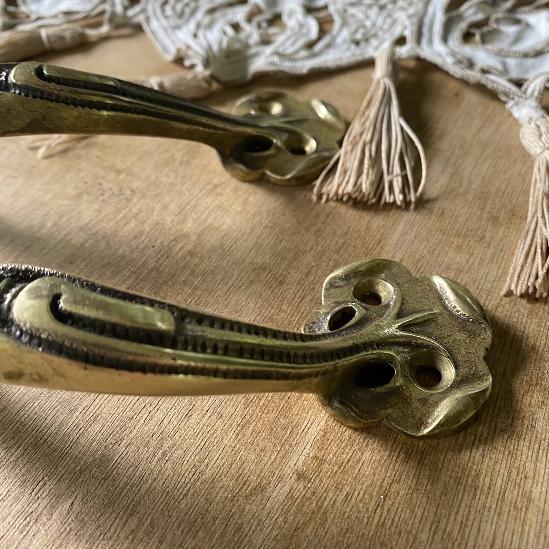 Pair of antique Art Nouveau brass handles